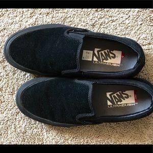 black suede slip on vans